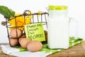 Basket of brown eggs and pitcher of milk