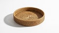 Basket casts a soft shadow on a white surface emphasizing its three dimension Royalty Free Stock Photo