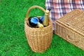 Basket With Champagne Wine, Picnic Hamper And Blanket Royalty Free Stock Photo