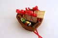 Basket of chocolate with form of heart. Royalty Free Stock Photo