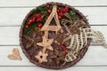 Basket with Christmas decorations. Wicker toys