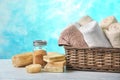 Basket with clean towels, soap and sea salt