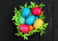 Basket with colored easter eggs. Easter holiday Royalty Free Stock Photo