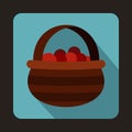 Basket with cranberries icon, flat style