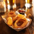 Basket of crispy onion rings with beer Royalty Free Stock Photo