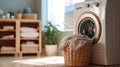 A basket with dirty laundry on the bathroom floor against the background of washing machines. Generative AI. Royalty Free Stock Photo
