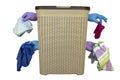 Basket for dirty Laundry. hands hold dirty things. white background, copy space. Royalty Free Stock Photo