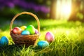 Basket of easter eggs with flowers on the grass in a sunny spring garden. Royalty Free Stock Photo