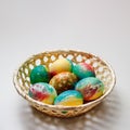 The basket with Easter eggs lies on the table. There is a place for an inscription Royalty Free Stock Photo