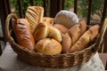 basket filled with assorted breads, from rustic baguettes to fluffy rolls Royalty Free Stock Photo