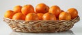 Basket of Clementine Mandarins on Table Royalty Free Stock Photo