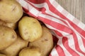 Basket filled with delicious raw Potatoes with copy space Royalty Free Stock Photo