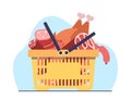 Basket filled with different kinds of meat products chops, sausages, bacon, ham and chicken. Butcher shop assortment