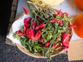 Basket filled with dried red pepper on a table Royalty Free Stock Photo