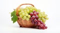 basket filled with fresh, plump green and red grapes, accompanied by a grape leaf, isolated on a white background Royalty Free Stock Photo