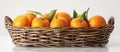 Basket Filled With Oranges on Table Royalty Free Stock Photo