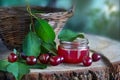 Basket of fresh cherries. Cherry jam, cherries on wooden table.  healthy food concept Royalty Free Stock Photo