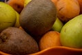A basket of fresh fruit, kiwi and medlars. Vitamin C important for the immune system. Royalty Free Stock Photo