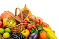 Basket with fresh fruits and vegetables isolated on a white back Royalty Free Stock Photo