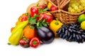 Basket with fresh fruits and vegetables isolated on a white back Royalty Free Stock Photo