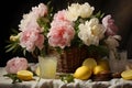 A basket of fresh peonies and irises in pastel colors on a white tablecloth with a glass of lemonade