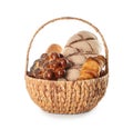 Basket with freshly baked bread products on white background Royalty Free Stock Photo