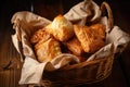 basket of freshly baked flaky puff pastries and turnovers, ready to be enjoyed