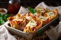 basket of freshly baked lasagna rollups, topped with melted mozzarella cheese Royalty Free Stock Photo