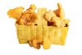Basket of freshly cut chanterelles isolated on white Royalty Free Stock Photo