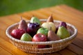 A basket of fruit with apples and pears Royalty Free Stock Photo