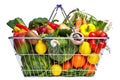 Basket fruit and vegetables isolated on white