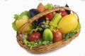 Basket with fruits and vegetables , photographed on a white back Royalty Free Stock Photo