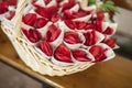 Basket full of cornets filled with red rose for wedding Royalty Free Stock Photo
