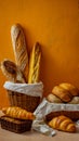 A basket full of different types of bread on a table Royalty Free Stock Photo