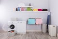Basket Full Of Dirty Clothes In Laundry Room Royalty Free Stock Photo