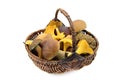 Basket full of edible mushrooms on white isolated background. Royalty Free Stock Photo