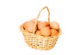 Basket full of eggs isolated Royalty Free Stock Photo