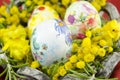 Basket full of handcolored Easter Eggs in decoupage closeup Royalty Free Stock Photo