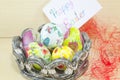 Basket full of handcolored Easter Eggs in decoupage Royalty Free Stock Photo