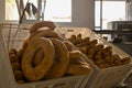 Basket full of loaves of bread inside the bakery. Royalty Free Stock Photo