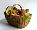 Basket full of mushrooms and berries Royalty Free Stock Photo