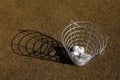 Basket of golf balls Royalty Free Stock Photo