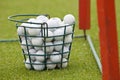 Basket of golf balls Royalty Free Stock Photo