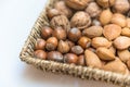 Basket with hazelnuts and almonds Royalty Free Stock Photo