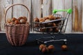 Basket Hazelnuts, filbert in burlap sack on wooden backdrop. heap or stack of hazelnuts