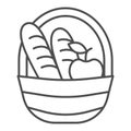 Basket with loaves and apple thin line icon, food concept, Picnic basket full of delicious fruits and bread sign on Royalty Free Stock Photo