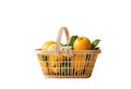 Basket made of eco materials with fruit on isolated background Royalty Free Stock Photo