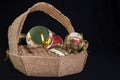 Basket made of jute filled with decorative christmas balls