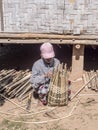 Basket maker in a village