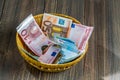 Basket with money from donations